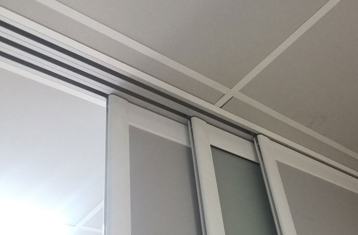 Cloison coulissante suspendue sur mesure, séparation de pièce